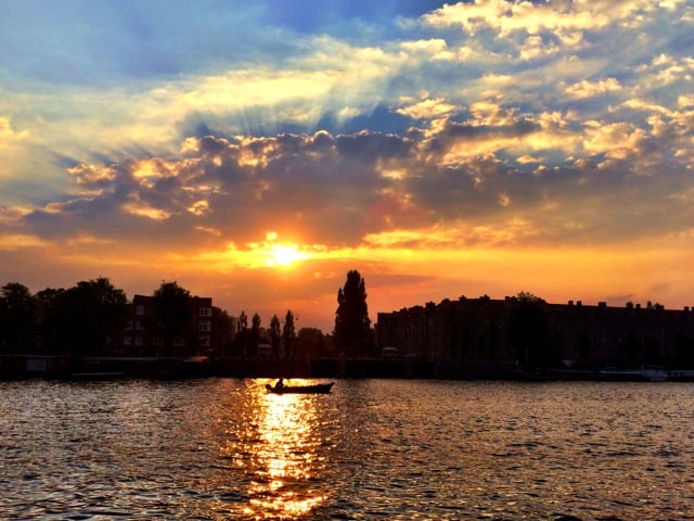 sunset-amstel-river-amsterdam-photo