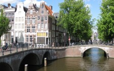 The canals of Amsterdam: a window into the city The intersection of the Keizersgracht and Leidsegracht.