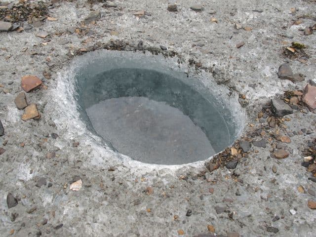 hole-in-glacier-ice hole-in-glacier-ice-photo