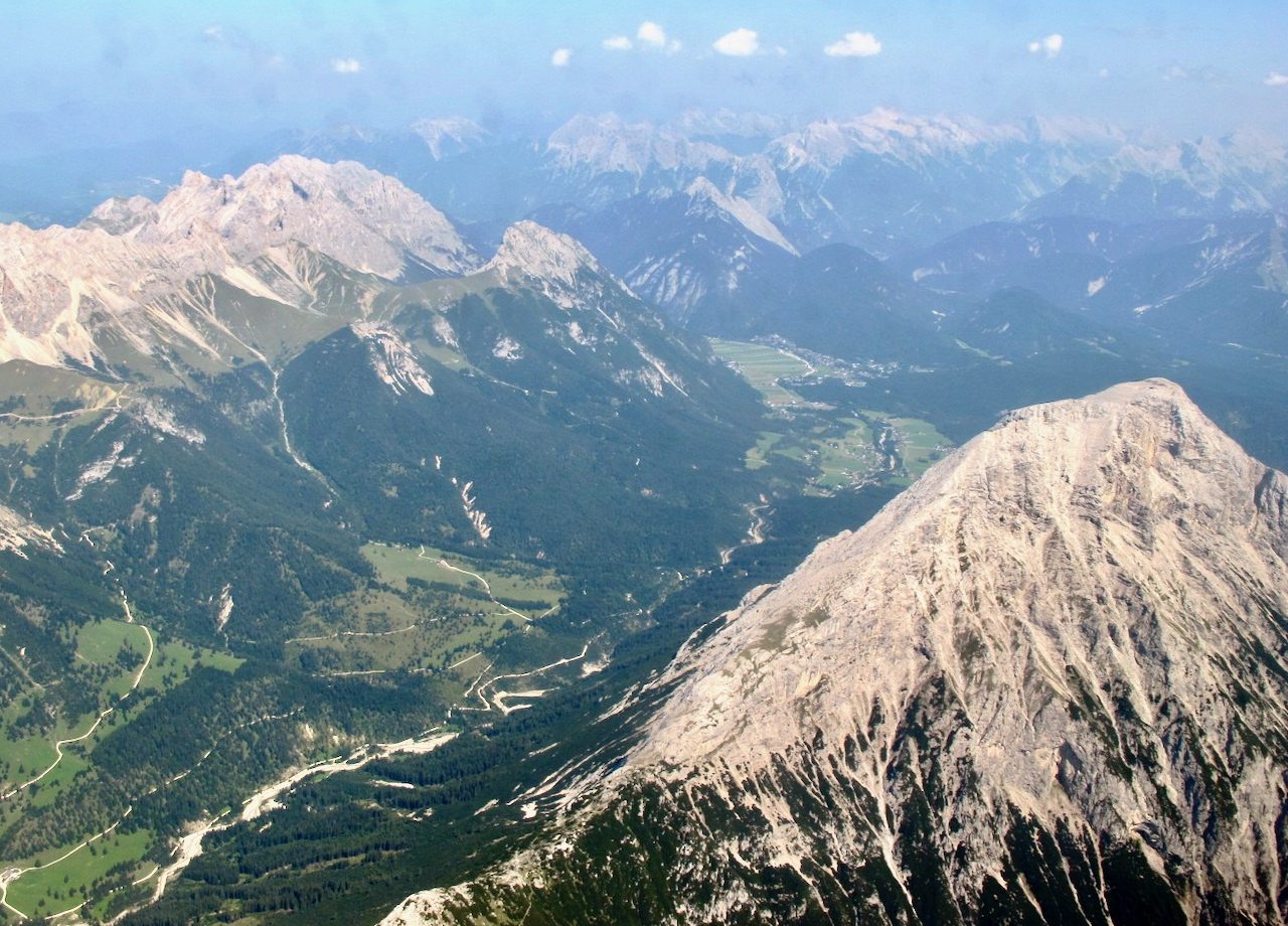 tyrol-alps-plane-window-view-photo