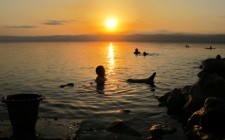 Experiencing the Dead Sea floating-dead-sea-sunset-photo