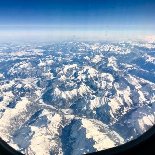 european-alps-plane-window-view-photo