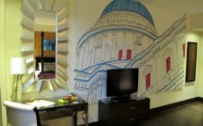 A funky boutique hotel in the City hotel-indigo-tower-hill-mural-photo