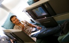 Is plane talk dying? In cathay Pacific's Business Class cabin, screen separate each passenger.