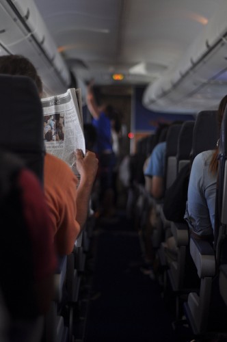Reading the paper (image courtesy of Dalton Reed).