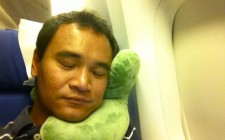 How to sleep well on a plane Me and my J-Pillow. Notice my happy face. ;-)