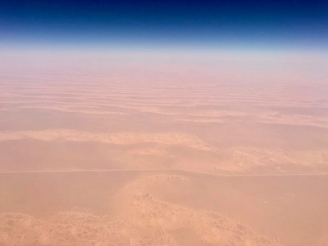 plane-window-view-sahara-desert-photo