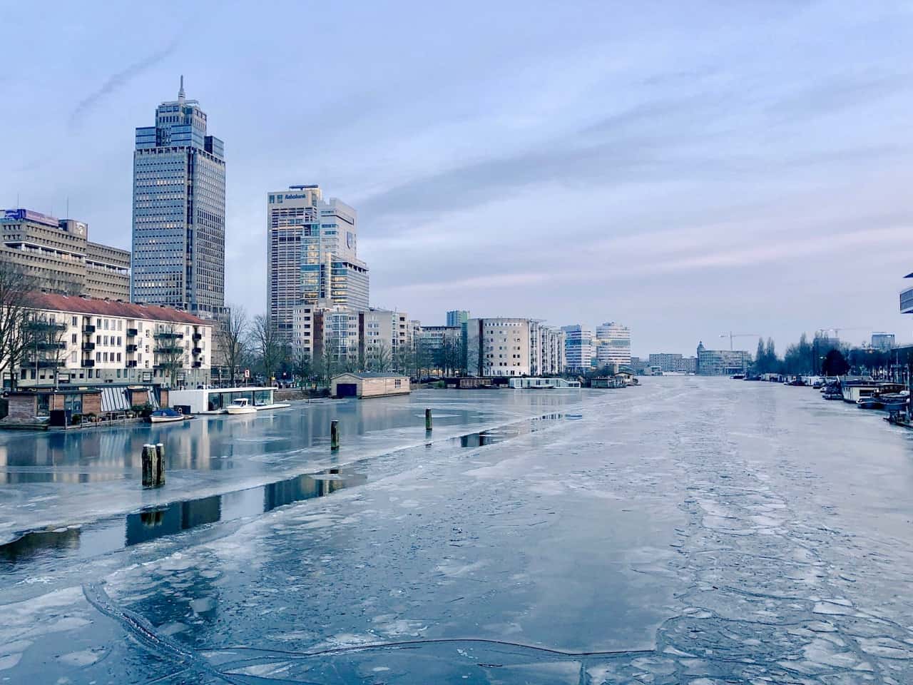 Iceskating and fun on the frozen canals of Amsterdam