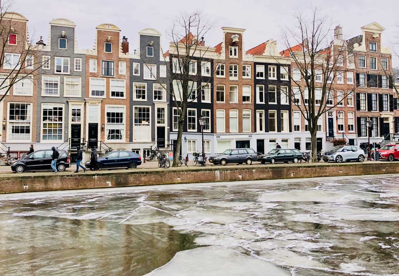 Ice-skating And Fun On The Frozen Canals Of Amsterdam