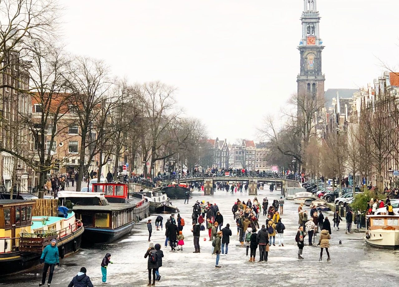 ice-skating-frozen-canal-amsterdam-photo