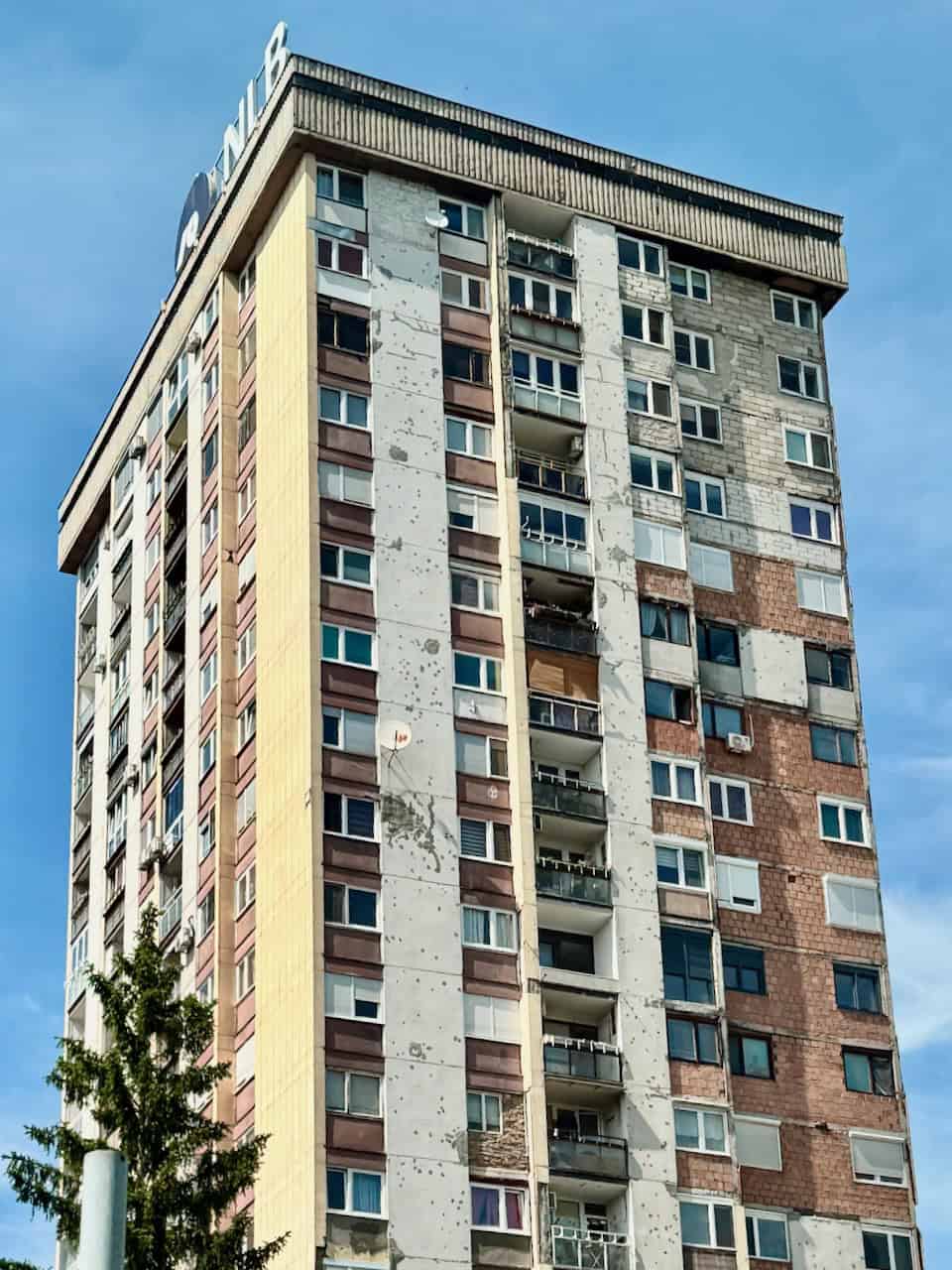 building with bullet holes sarajevo